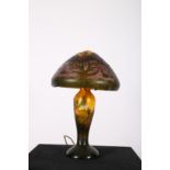 A GALLE DESIGN ETCHED GLASS TABLE LAMP with mushroom shaped shade above a baluster column on
