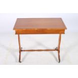 A 19TH CENTURY SATINWOOD SIDE TABLE the rectangular top with frieze drawer on standard end supports