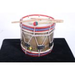 A BRASS AND POLYCHROME DRUM 37cm (d)