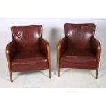 A PAIR OF RETRO CHERRYWOOD AND HIDE UPHOLSTERED EASY CHAIRS each with rectangular back and seat