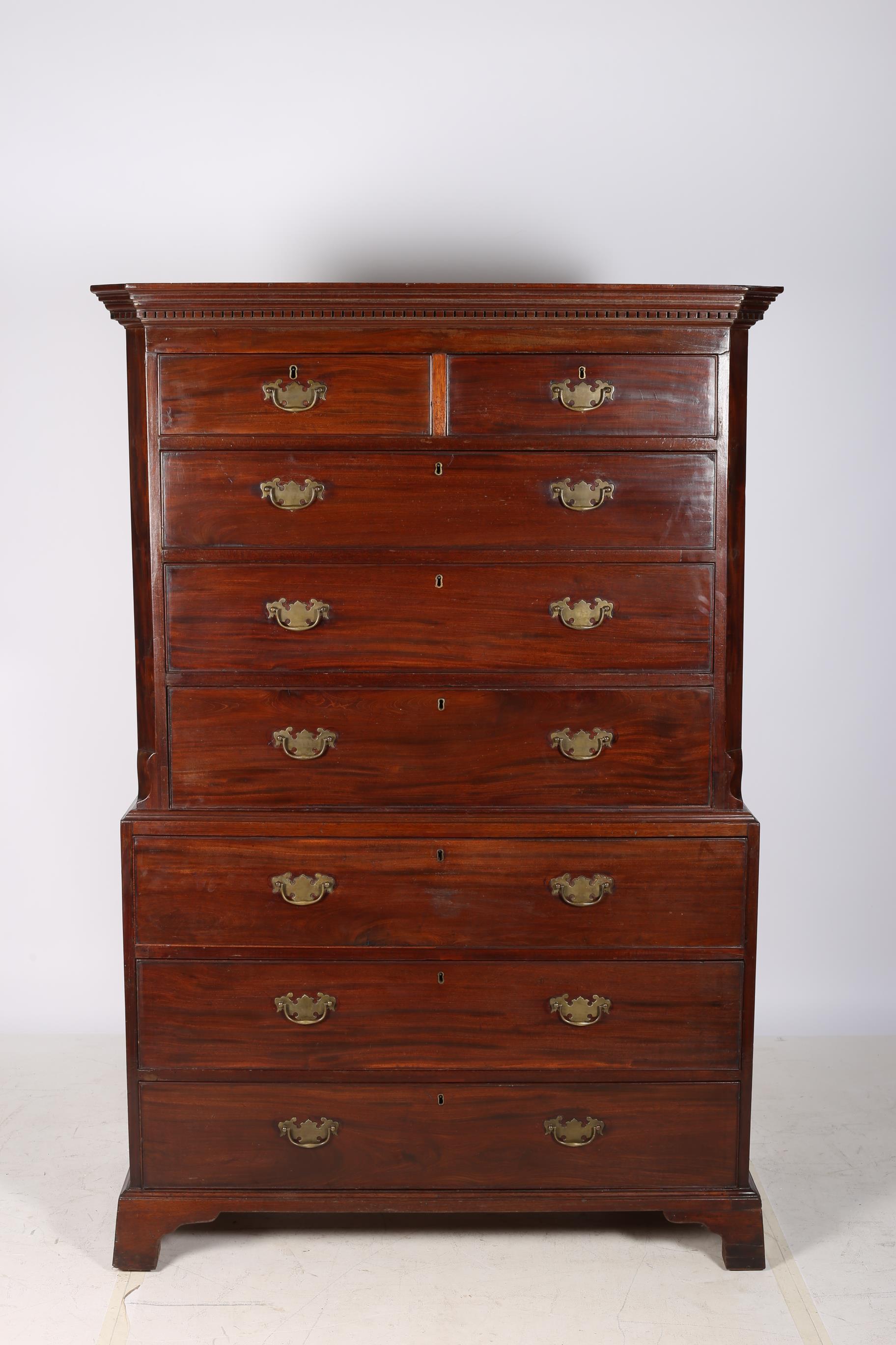 A FINE GEORGIAN MAHOGANY CHEST ON CHEST the dentil moulded cornice above two short and three long