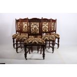 A GOOD SET OF SIX 19TH CENTURY CARVED MAHOGANY AND UPHOLSTERED DINING CHAIRS each with a shaped top