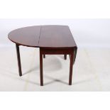 A GEORGIAN DESIGN MAHOGANY DROP LEAF TABLE the oval hinged top on square moulded legs 71cm (h) x