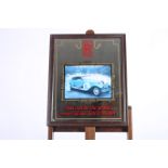 AN ADVERTISING MIRROR inscribed Rolls Royce You can be the proud owner of our latest model 58cm x