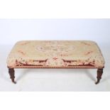 A FINE WILLIAM IV STYLE MAHOGANY AND NEEDLEWORK UPHOLSTERED FOOTSTOOL of rectangular outline the
