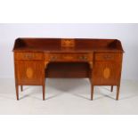 A SHERATON DESIGN MAHOGANY AND KINGWOOD CROSS BANDED SIDEBOARD of rectangular bowed outline the