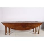 A GEORGIAN DESIGN MAHOGANY HUNT TABLE the oval hinged top raised on square moulded legs 75cm (h) x