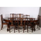 A THIRTEEN PIECE CHIPPENDALE DESIGN MAHOGANY DINING SUITE comprising a harlequin set of twelve