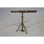 A BRASS TABLE TOP ADJUSTABLE TELESCOPE on tripod support fully extended 90cm (h) x 70cm (w)