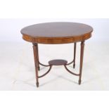 A 19TH CENTURY MAHOGANY AND SATINWOOD INLAID OCCASIONAL TABLE the oval top above an inlaid frieze