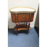 A FRENCH KINGWOOD AND GILT BRASS MOUNTED TABLE,