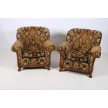 A PAIR OF RETRO WALNUT AND UPHOLSTERED TUB SHAPED CHAIRS each with a curved back and scroll over