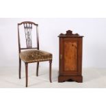 A 19TH CENTURY MAHOGANY AND WALNUT PEDESTAL of rectangular form with panelled door on shaped