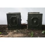 A PAIR OF LEAD PLANTERS each of square form decorated with lion mask heads 28cm x 26cm
