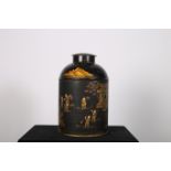 A JAPANNED LIDDED TEA CADDY of cylindrical form decorated with figures in a landscape 35cm (h)
