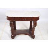 A 19TH CENTURY CARVED MAHOGANY SIDE TABLE surmounted by a white veined marble top above a frieze