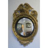 A GOOD 19TH CENTURY GILTWOOD AND GESSO CONVEX MIRROR the circular ball decorated frame surmounted