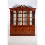 A FINE GEORGIAN DESIGN MAHOGANY LIBRARY BOOK CASE the architectural cornice above four astragal