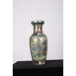 AN ORIENTAL STYLE VASE of baluster form the white a blue ground decorated with exotic birds