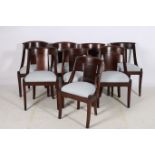 A HARLEQUIN SET OF EIGHT ITALIAN MAHOGANY DINING CHAIRS CIRCA 1940s each with a curved back and