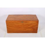 A VERY FINE CAMPHOR WOOD TRUNK of rectangular outline the hinged lid with brass sunken handle