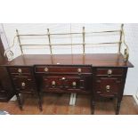 A VERY FINE IRISH REGENCY MAHOGANY SIDEBOARD by James Hicks of inverted breakfront outline the