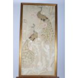 A FRAMED NEEDLEWORK PANEL depicting exotic birds amongst foliage in gilt frame 98cm x 48cm