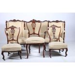 A 19TH CENTURY SIX PIECE DRAWING ROOM SUITE comprising a two seater wing back settee a lady's and