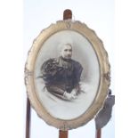 A BLACK AND WHITE PHOTOGRAPH PORTRAIT OF A FEMALE An oval in gilt frame 58cm x 42cm