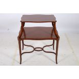 A 19TH CENTURY MAHOGANY CROSS BANDED TWO TIER ETAGERE of serpentine outline the detachable tray