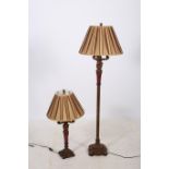 A CONTINENTAL GILT FRAME AND POLYCHROME FLOOR STANDARD LAMP 162cm (h) with pleated shade together