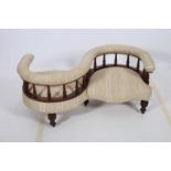 A 19TH CENTURY MAHOGANY CONVERSATION SEAT the S shaped top rail with baluster splats and