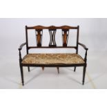 A 19TH CENTURY MAHOGANY AND MARQUETRY SETTEE the shaped top rail above a pierced vertical splat