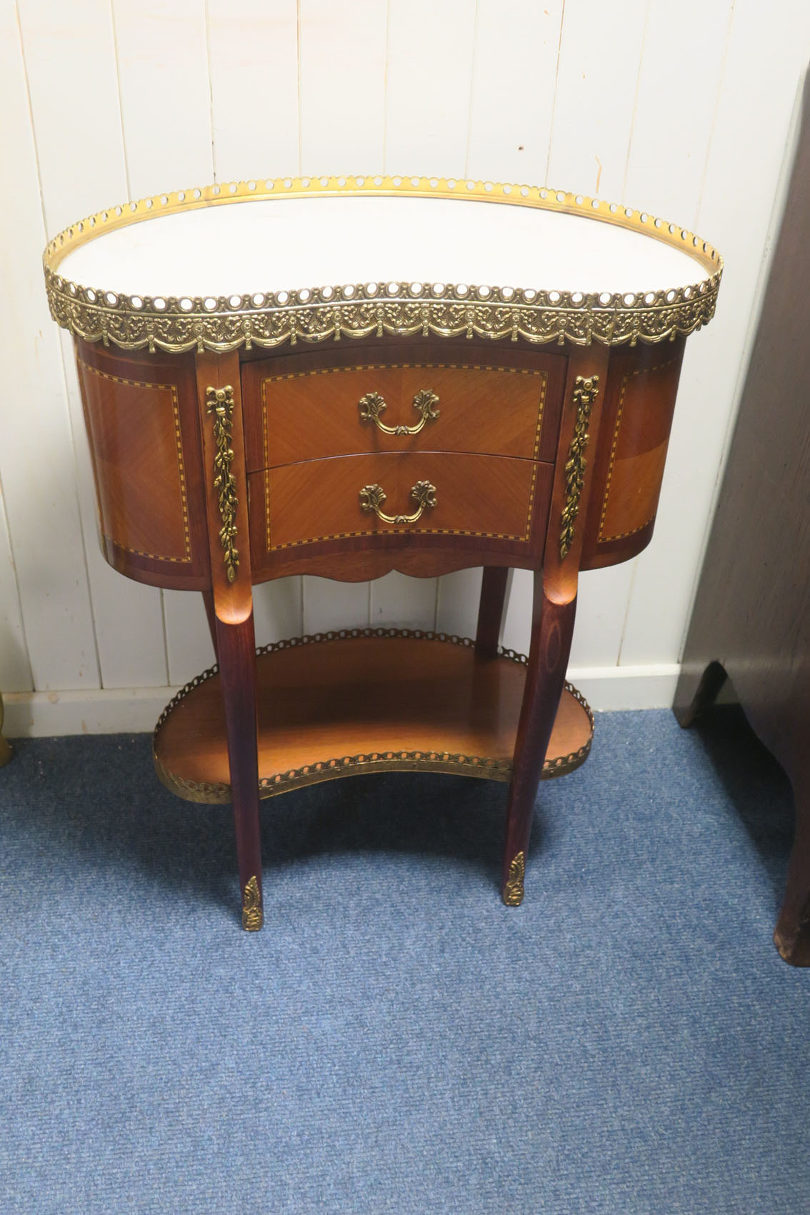A FRENCH KINGWOOD AND GILT BRASS MOUNTED TABLE,