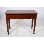 A 19TH CENTURY MAHOGANY SIDE TABLE of rectangular outline the shaped top with frieze drawer on