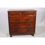 A 19TH CENTURY MAHOGANY CHEST of rectangular outline the shaped top with two short and three long