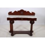 A 19TH CENTURY MAHOGANY SIDE TABLE of serpentine outline the shaped top with white veined marble