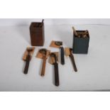 A COLLECTION OF LEATHER TOOLING STAMPS AND TOOLS