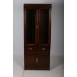 A CANADIAN HARDWOOD CHINA DISPLAY CABINET of rectangular outline with glazed doors the interior