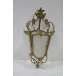 A HEAVY GILT BRASS AND FROSTED GLASS SINGLE LIGHT HALL LANTERN of cylindrical tapering form with