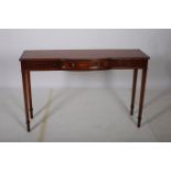 A MAHOGANY CROSS BANDED SIDE TABLE of rectangular bowed outline the shaped top with frieze drawer