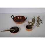 A SET OF SEVEN COPPER AND BRASS GRADUATED FRYING PANS together with seven copper and brass