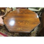 AN EDWARDIAN ROSEWOOD AND SATINWOOD INLAID OCTAGONAL SHAPED CENTRE TABLE with outswept legs 70cm