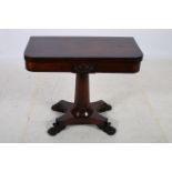 A 19TH CENTURY ROSEWOOD FOLD OVER CARD TABLE the rectangular hinged top containing a baize lined