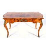 A VERY FINE 19TH CENTURY BURR WALNUT AND GILT BRASS MOUNTED CENTRE TABLE of serpentine outline the