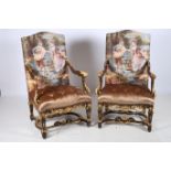 A PAIR OF CONTINENTAL HARDWOOD PARCEL GILT AND UPHOLSTERED ARMCHAIRS each with a rectangular arched