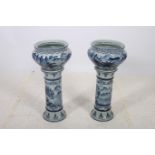 A PAIR OF CONTINENTAL BLUE AND WHITE JARDENIER ON PEDESTALS each of ovoid tapering form the white