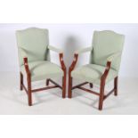 A PAIR OF GAINSBOROUGH DESIGN MAHOGANY AND UPHOLSTERED ARMCHAIRS each with a rectangular arched