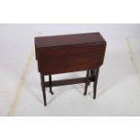 A 19TH CENTURY MAHOGANY AND SATINWOOD INLAID SUTHERLAND TABLE the rectangular hinged top with