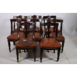 A GOOD SET OF EIGHT 19TH CENTURY CARVED MAHOGANY DINING CHAIRS each with a shaped top rail and